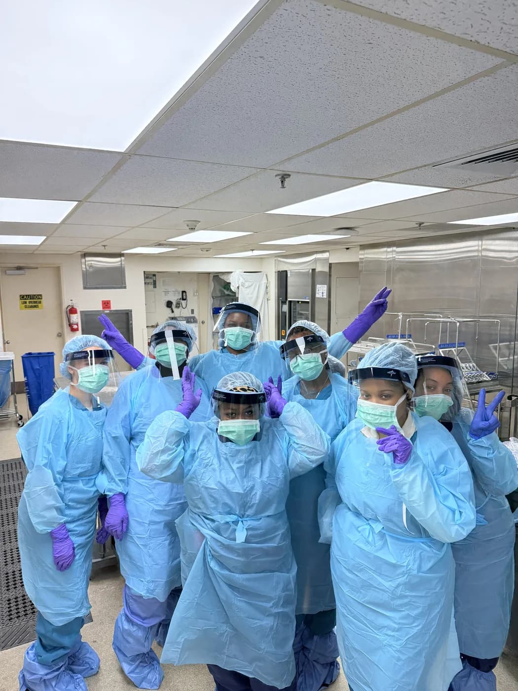 ATS sterile processing students in full PPE in the training lab